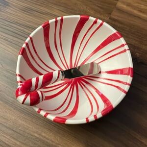 Candy cane dip a bowl with spreading knife